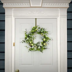 22 in. Easter Wreath Decorated with Pastel Eggs, Blue Flowers