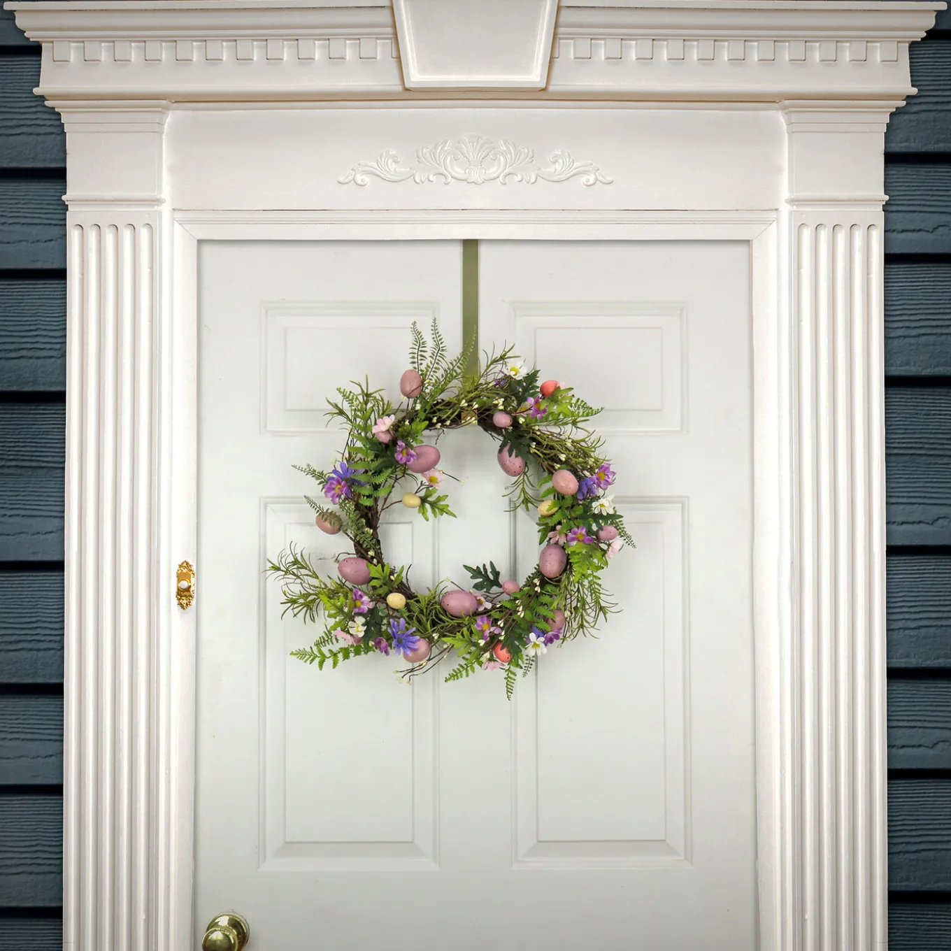 22 in. Easter Wreath Decorated with Pink Pastel Eggs, Purple Flowers, Ferns, Leafy Greens