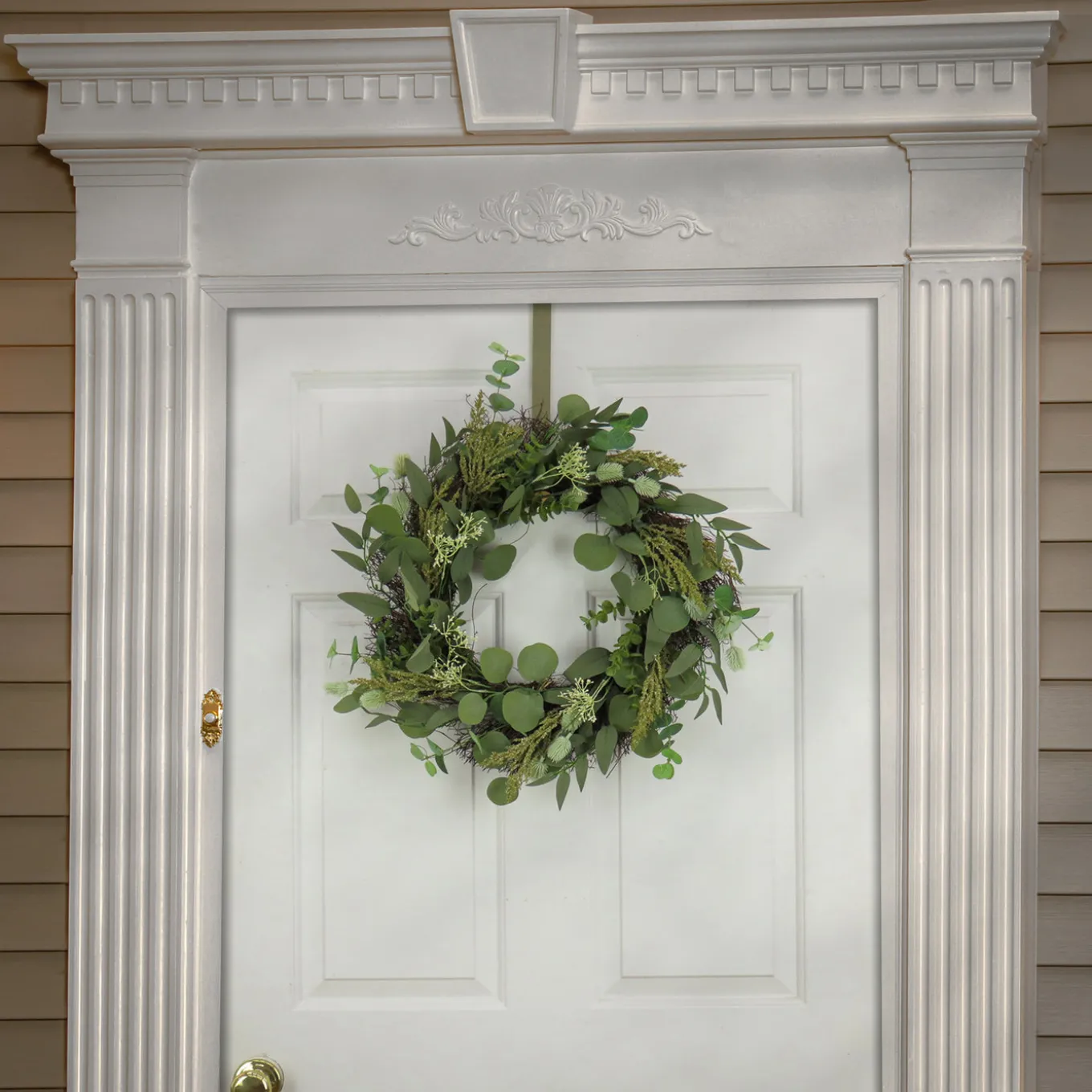 22 in. Spring Wreath with Eucalyptus Leaves, Baby's Breath, Flowing Green Stems